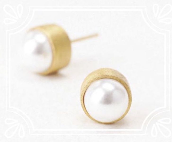 Evie -  Style: Simple and stylish pearl studs encased in brushed gold.